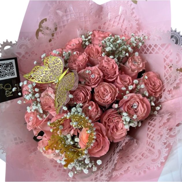 Pink bouquet with a gold butterfly and crown