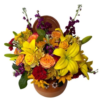 Lilies, roses, carnations and other bouquet in a vase
