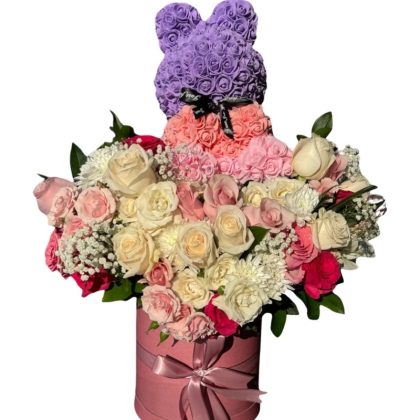 roses bouquet with a teddy bear in a box